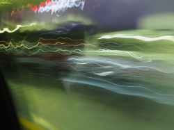 streaks of light in a car garage